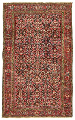 un tapis rouge avec un motif floral sur fond blanc