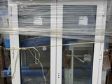 a window that is wrapped in plastic and sitting on a pallet