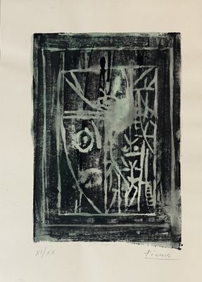 a black and white drawing of a face on a piece of paper