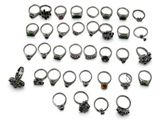 an assortment of rings and rings on a white background