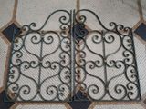 pair of antique wrought iron fireplace grates