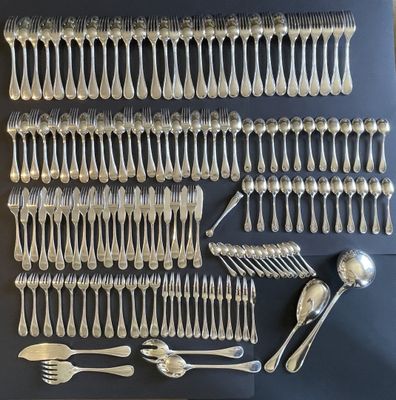 an assortment of silverware including forks, spoons and spoons