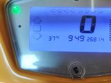 a close up of a digital clock on a yellow device