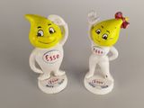 two figurines of the same character on a table