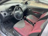 a car with red seats and a steering wheel