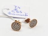 pair of diamond stud earrings on a white background with a price tag