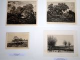 four black and white pictures of trees and a farm in the distance