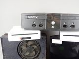 two electronic devices sitting on top of each other