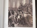 an open book with a picture of a group of people on it