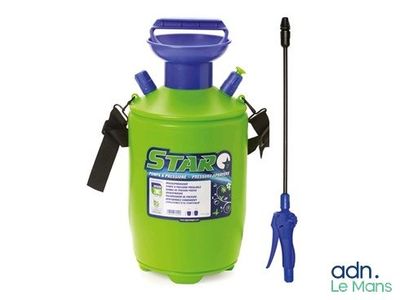 a close up of a green sprayer with a blue handle