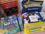many books that are sitting on a table