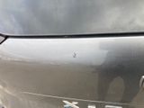 a close up of a car ' s emblem on the back of the car