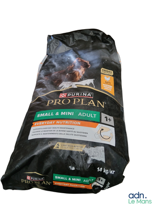 a bag of pro plan small and mini adult dry dog food on a white background