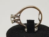 an image of a ring with a diamond in it