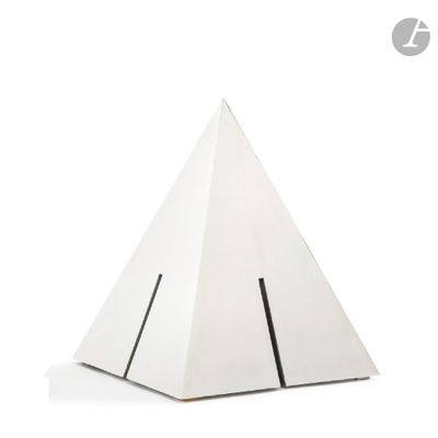 a white paper pyramid with a black stripe on it