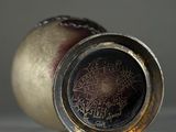 an image of a vase with a decorative design on it