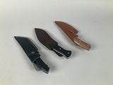 three different types of knifes on a white surface
