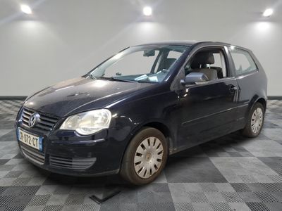 a picture of a blue car parked on a checkered floor