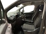 the interior of a car with the driver ' s seat folded down