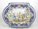 une image représentant une assiette bleue et blanche ornée d'une peinture