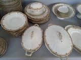 a lot of plates that are sitting on a table