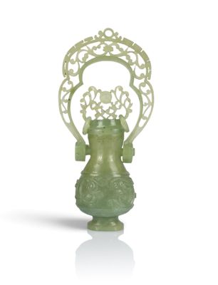 an image of a green vase sitting on top of a white surface
