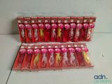 a bunch of different types of fishing lures in plastic bags