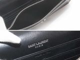 a picture of the inside of a black purse