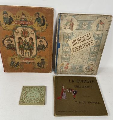 three books sitting on top of a white table next to each other