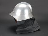 a helmet that is sitting on top of a piece of paper