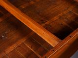 a wooden box that has a drawer inside of it