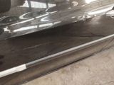 a close up of a car door handle with a sticker on it