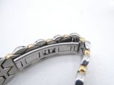 a close up of a watch bracelet on a white surface