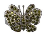 une image d'une bague en forme de papillon ornée de cristaux verts et blancs
