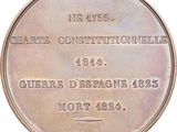 a close up of a medal on a white background
