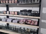a large display of makeup products in a store