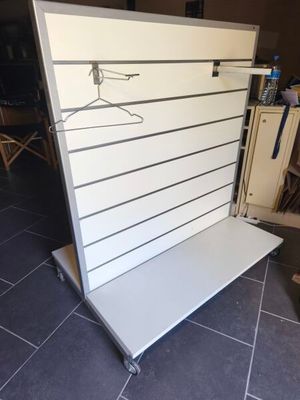 a white board with a hanger attached to it