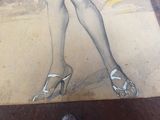 drawing of a woman ' s legs in high heels on a wooden table