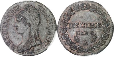 a silver coin with a woman ' s head on it