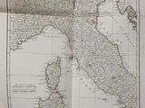 an old map of italy and italy with the borders of the country