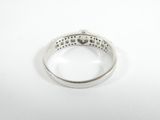 a close up of a ring on a white surface
