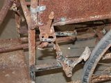 a rusted bike that is sitting in a room