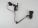 a close up of a hair dryer on a table with a cord