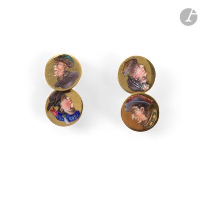 a pair of earrings with pictures of people on them