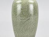 chinese celade vase with a dragon design