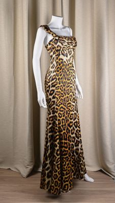 an image of a mannequin wearing a leopard print dress