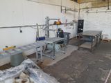 an image of a factory with a lot of work on it