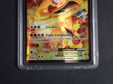 a close up of a pokemon card in a plastic case