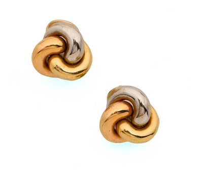 Boucles d'oreilles en forme de nœud bicolores, or et argent, sur fond blanc
