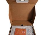 a box with a package inside of it on a white background